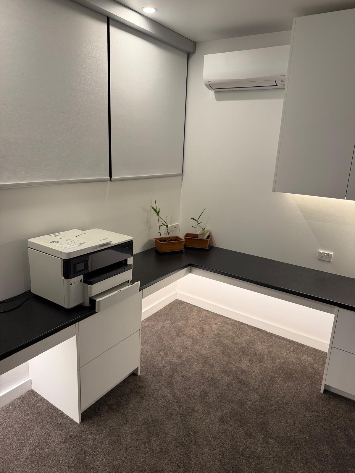 Split-system air-conditioner and power installation in a home office fit-out